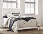 Paxberry Queen Panel Bed with Mirrored Dresser and Nightstand